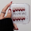 Faux Ongles Mon Louboutin : Pointe Rouge Audacieuse avec Accents Cristallins