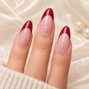 Faux Ongles Mon Louboutin : Pointe Rouge Audacieuse avec Accents Cristallins